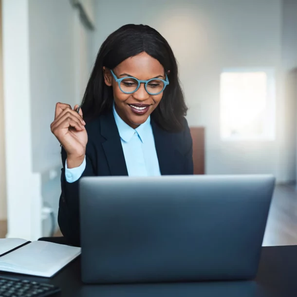 Business owner looking at her laptop