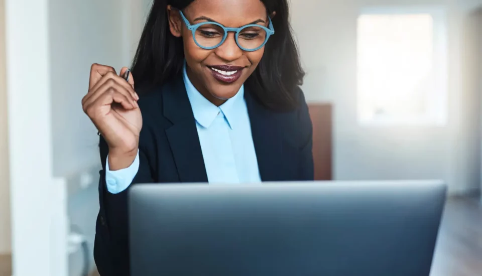 Business owner looking at her laptop